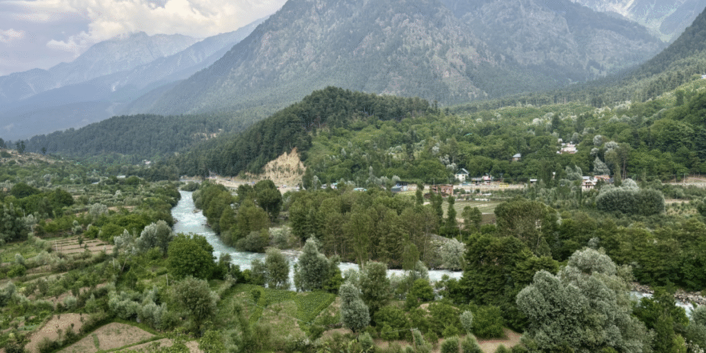 Rampant construction, such as this on the banks of Lidder river, which drains into Jhelum, are responsible for damaging the river ecosystem which aggravates threat of floods. Photo: Jehangir Ali