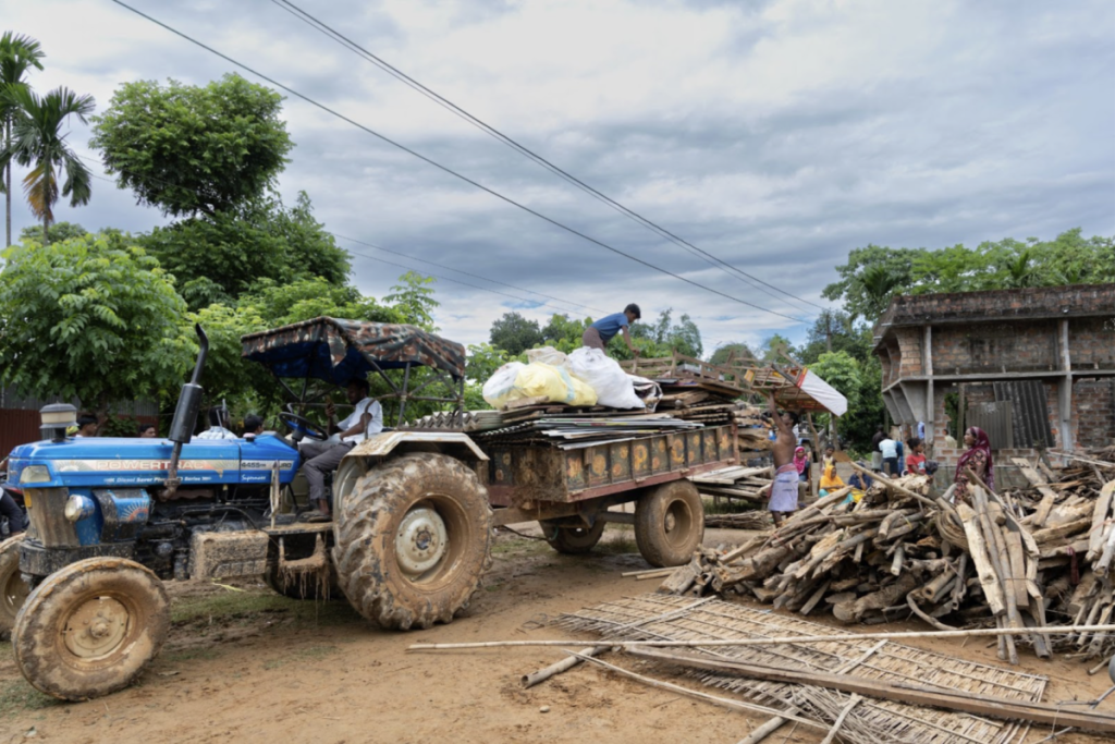 Families in Santoshpur Jangal Block hurriedly load their belongings onto a tractor trolley after being given just two days to evacuate. Photo: Kazi Sharowar Hussain