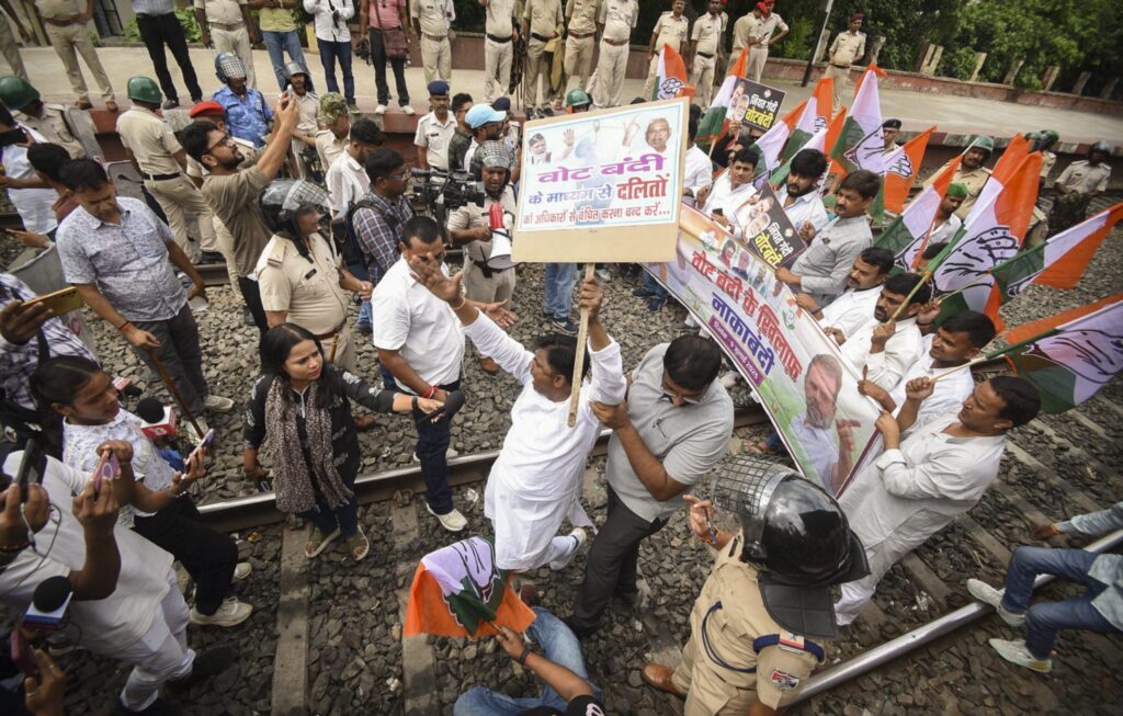 Congress supporters block railway tracks during a protest amid ‘Bihar bandh’ called by the INDIA bloc against Special Intensive Revision in the state, at Sachiwalay Halt Railway station in Patna, Wednesday, July 9, 2025. Photo: PTI