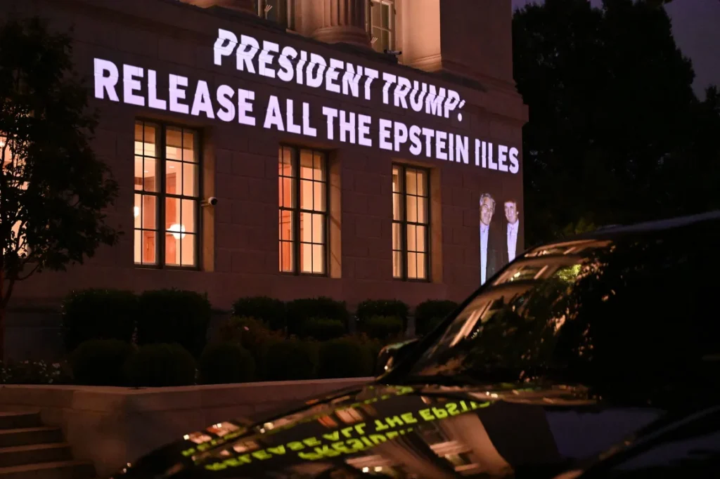 A message calling on Trump to release all files related to Jeffrey Epstein is projected onto the US Chamber of Commerce building across from the White House on July 18, 2025.