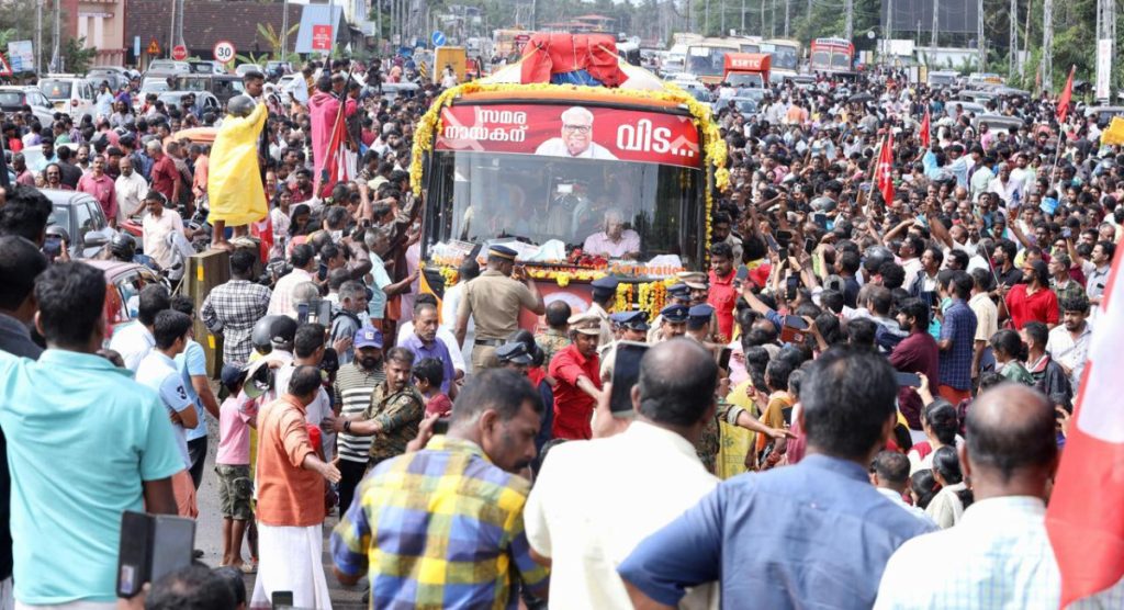 Mourners gather during Achuthanandan’s final journey.