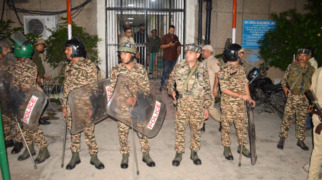 Security personnel stand guard after at a hospital, in Jammu, Thursday, July 24, 2025.