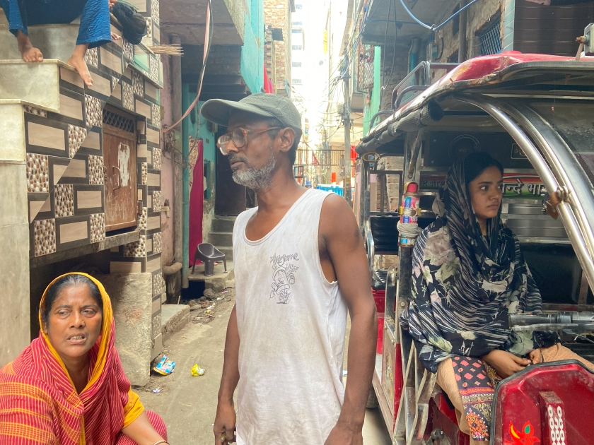 Residents of J.J. Colony. Sajan is in the centre, Shabnam on the right.