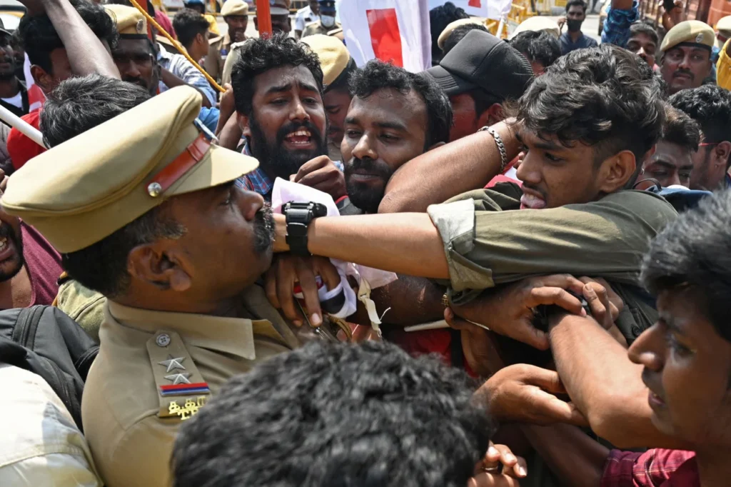 Students of Democratic Youth Federation of India scuffle with police during a protest against the imposition of Hindi in non-Hindi speaking states, in Chennai, Tamil Nadu, in October 2022.