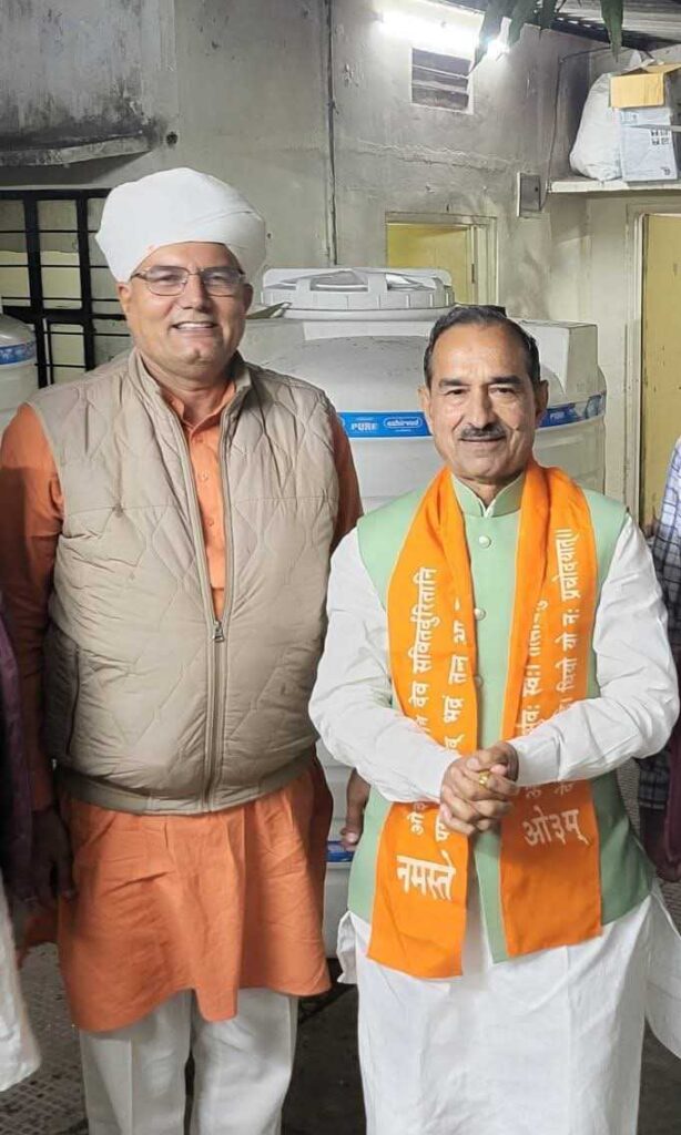 Krishan Kumar Janu (left) with Rajasthan BJP president Madan Rathore.