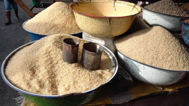 The derica-size tin is on the left at a Lagos market