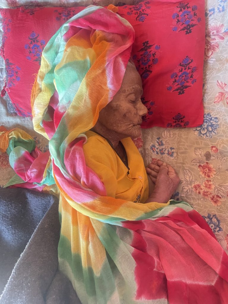 Amari Devi of the hamlet Baliya Ka Vaan in Rajsamand was never able to enrol in Aadhaar as her biometrics could not be captured in old age. She was bedridden for three years and marked as being out of state in September 2023, and her pension cancelled. Photo: Anumeha Yadav