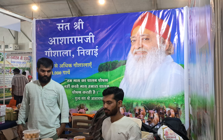 Devotees of jailed self-styled godman Asaram at a stall selling cow products at the “gau mahakumbh” in Jaipur. 