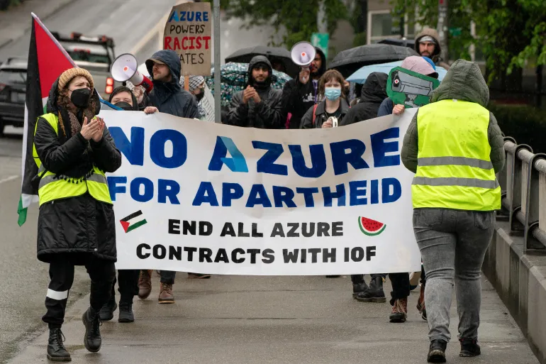 Demonstrators march in support of Palestinians in Gaza near the Microsoft Build conference, during the ongoing Israeli war on Gaza, to call for the termination of Microsoft’s Azure contracts with Israel, in Seattle, Washington, US, on May 21, 2024